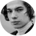 A black and white photo of a man in a suit.